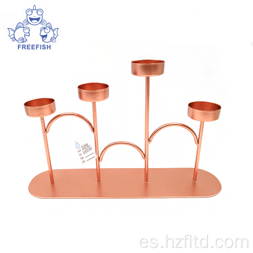 Juego de candelabros de metal dorado rosa con 4 brazos